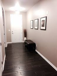 Front Entry With Dark Distressed Hardwood Floors Sherwin Williams Perfect Greige Color On Paint Colors For Living Room Living Room Paint Hardwood Floors Dark