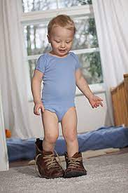 Enter your location to see which movie theaters are playing in his father's shoes near you. Toddler Trying To Walk In His Father S Shoes Stockphoto