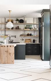 Black And White Kitchen Floor Tiles Design Dark Green Kitchen Cabinets And Hand Laid Black And White Tile Flooring It S A Diy With A Tutorial Green Kitchen Cabinets Kitchen Flooring Kitchen Floor Tile
