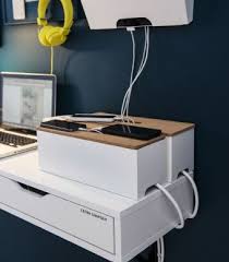 Close Up Of Cable Management Boxes Used To Charge Mobile Phones Cable Management Box Cable Management Work Space Organization