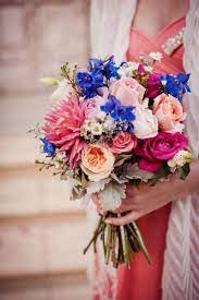 The best blue wedding flowers (and 16 gorgeous blue bouquets) if you're sold on this versatile shade for your wedding color palette, we have the perfect stems to round out your arrangements. Blue Pink Bridesmaid Bouquet Bridesmaids Bouquets Pink Bridesmaid Bouquet Blue Wedding Bouquet