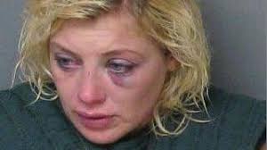 Woman Goes After Husband With Machete, Kicks Officer