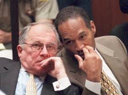 CROSS-EXAMINERAttorney F. Lee Bailey listens to OJ Simpson during testimony  of FBI agent William Bodziak at the 1995 trial in Los Angeles. (Pool Photo)
