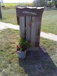 Well pump covers and decorative wooden lighthouse lawn and garden ornaments with solar lighting. Made A Mini Outhouse Out Of Trash Deck Wood Covers Well Pump Access Real Nice Garden Decor Projects Water Well House Well Pump Cover
