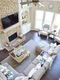 The sectional is a custom designed and built piece that helps meet the needs of the is family…you can sit at the game table and still engage with others in the sectional sofa works to define the footprint of the living room. Sectional Living Room Layout With Fireplace Novocom Top