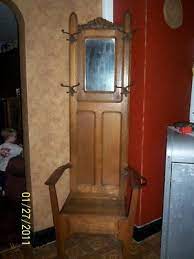 Its seven hooks keep hats and jackets within easy reach while a spacious lower cubby the modern silhouette includes a bench seat that doubles as a depository for handbags, backpacks and more. Antique Solid Oak Hall Tree Bench Seat W Mirror 1920 S 132846853