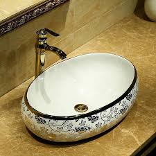 Oval Shape Art Wash Basin Ceramic Counter Top Wash Basin Bathroom Sinks Ceramic Wash Basin Gold In 2020 Wash Basin Basin Kids Room Lighting Fixture