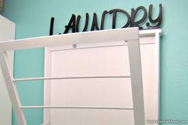 Then hang a drying rack from it. Drying Rack Laundry Room Houselogic