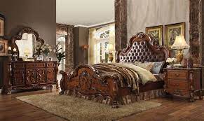 The bed is complemented by a thick, tufted upholstery surrounded with individual nailheads. Acme Dresden Upholstered Bedroom Set In Cherry Oak