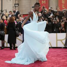 This beautiful dress gives credits to lavender. Great Outfits In Fashion History Lupita Nyong O In Princess Worthy Prada Fashionista