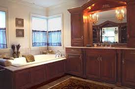 We can make rustic bathroom vanities in a variety of wood types and styles. Cherry Wood Bathroom Cherry Wood Vanity With A Valance Two Wall Cabinets For Storage Bathrooms Remodel Dream Bathrooms Luxury Bathroom