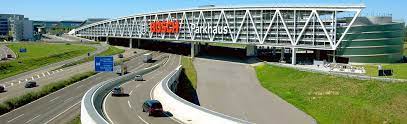 A piece of land with few or no buildings within or. Parken Messe Stuttgart