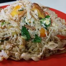 Nasi goreng is often described as an indonesian rice dish cooked with pieces of. Nasi Goreng Ikan Bilis At Saffrons Halal Tag Singapore