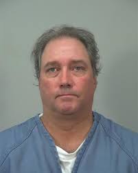 Man robbed at gunpoint in Janesville, 1 suspect arrested, another at large