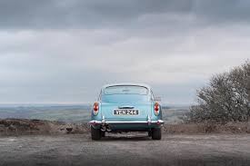 Image result for Caribbean Pearl 1964 Aston Martin