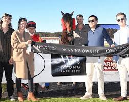 RYAN STRIKES ON HOME TRACK