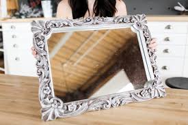 Adding a frame to a builder grade bathroom mirror is an easy and cost effective way to update the mirror without having to remove it or replace it. Diy Vanity Mirrors Hacks The Sorry Girls