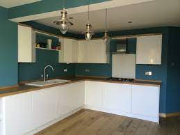 Maybe you would like to learn more about one of these? This Lovely Kitchen Has High Gloss White Handless Doors With Solid Oak Worktops All The Base White Kitchen Interior Design White Kitchen Interior Wood Kitchen