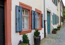 And this house trimmed out in orange. How To Pick Shutter Colors West Magnolia Charm