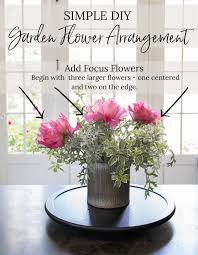 Check out this video tutorial to learn the steps to create a variety of fake plant twigs in a container with pebbles and attach tissue paper flowers on them. Simple Diy Garden Flower Arrangement Sanctuary Home Decor