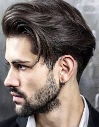 The drama of loose hair meets the sleekness of a man bun. Trending Haircuts For Men 2020 James Bushell Barbers Hairdressers