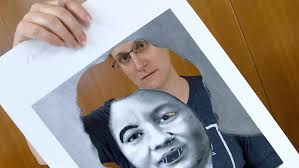 USU campus community creates stencil portraits of successful women for  mural