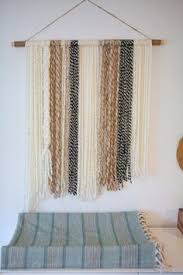 This simple and elegant macrame hanging is perfect for adding that extra something to your space or event. 100 Bohemian Wall Decor Ideas Bohemian Wall Decor Macrame Wall Decor