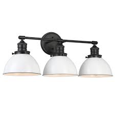 It's crafted from metal, and it features a rounded mount with tapered edges, a thin, horizontal arm with capped ends, and two curved arms in an old bronze and natural brass finish. Design House Savannah Farmhouse 3 Light Matte Black Vanity Light With White Shades 588301 The Home Depot