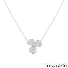 The pendant features a flower motif with 3 petals pave set with round brilliant cut diamonds with a tot. Tiffany Co Platinum Diamond Paper Flowers Pendant Rich Diamonds