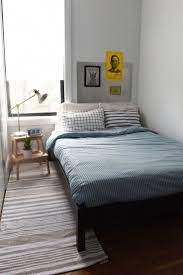 Stay grounded and go bed frameless. How To Fix A Guy S Room In 10 Days Ikea Small Bedroom Tiny Bedroom Small Apartment Bedrooms
