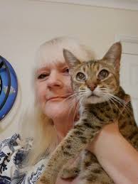 Can someone kindly make my cats eyes look nice. This is the only photo of  us together. She had poorly eyes all her life and nothing could have been  done.