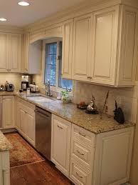 Cream Cabinets With Cocoa Glaze Nvg Granite White Subway Tile Trendy Kitchen Backsplash Cream Kitchen Cabinets Kitchen Renovation
