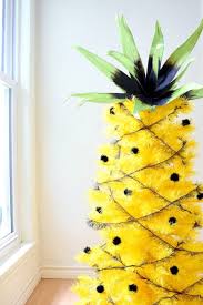 Around christmas, many seasonal shops sell a large variety of ornaments and websites like etsy and ebay are other great places to look for unique ornaments. Decorating Ideas For Yellow Orange Christmas Trees Treetopia