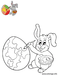 Coloriage Lapin De Paques Qui Peinture Un Oeuf Dessin Lapin De Paques A Imprimer
