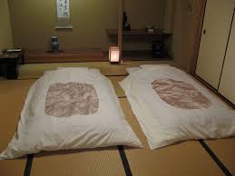 Japanese bedding consists of a mattress, called a futon or _shikibuton_, a sheet, a quilt, and a pillow. A Futon å¸å£ Is Traditional Japanese Bedding Comprising A Quilted Mattress That Is Usually Laid On The Floor A Bedding Japanese Futon Futon Bed Futon Bedroom