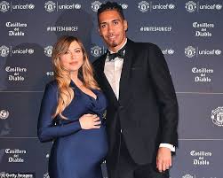 Chris sky, as he goes on social media, is seen at a rally. Chris Smalling Held By An Armed Robber In His House With An Italian Model Wife And Son London News Time