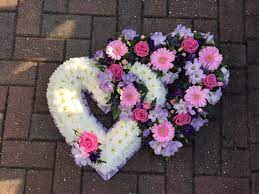 Loops of steel grass complete this elegant design. Combination Double Heart Buy Online Or Call 01474 355007