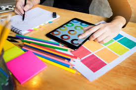Men Working As Fashion Designer Choosing On Colour Chart For
