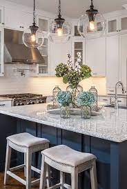 Rustic black wire frames with antique style bulbs are fresh, modern, and delightfully industrial. Love The Lighting I Also Love The Blue Island Kitchen Decor Home Kitchens Kitchen Remodel
