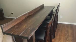 Great Way To Add Extra Seating To An Entertaining Room Also Less Invasive Than A Coffee Table Just P Pub Table And Stools Table Behind Couch Bar Behind Couch
