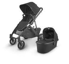 Squeeze button at top and slide handle to one of three desired . Amazon Com Uppababy Cochecito Vista V2 Jake Negro Carbono Cuero Negro Todo Lo Demas