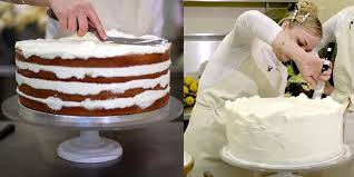 Ptak ices the famous cake. Video Shows Making Of Prince Harry Meghan Markle S Royal Wedding Cake