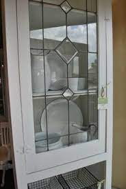 Reflective surfaces assist in expanding the space, as do glass doors because the mind peers beyond the door's face surface. 49 Stained Glass Cabinet Doors Ideas Stained Glass Cabinets Glass Cabinet Doors Stained Glass