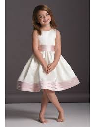 Girl Smiling Wearing A White Satin Dress With Pink Ribbons Dresses For Girls Grey Backgro Flower Girl Dresses Toddler Flower Girl Dresses Girls White Dress