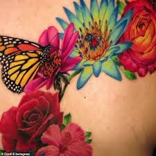 Check spelling or type a new query. Cardi B Unveils Her Entire Back Tattoo With Bright Pink Flowers And A Butterfly Sound Health And Lasting Wealth