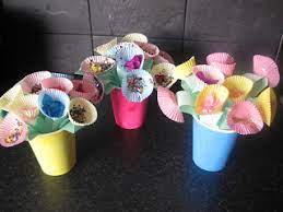 Cupcake liner flowers with lollipops. 24 Simple Cupcake Liner Flowers Guide Patterns