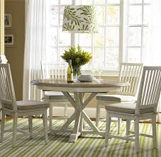 Dining room furniture white table 4 black upholstered side chairs metal legs. Coastal Beach White Oak Round Dining Room Set Zin Home