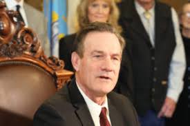 South Dakota governor signs bill loosening one of nation's harshest drug  laws • South Dakota Searchlight