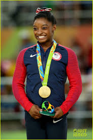 Simone biles is 4ft 8in tall. American Gymnast Simone Biles Wins First Ever Olympic Gold Medal In Women S Vault Via Usatoday Http Usat Ly 2 Simone Biles Rio Olympics Usa Gymnastics