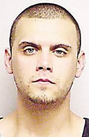 Suspect charged in year-old Domino's armed robbery